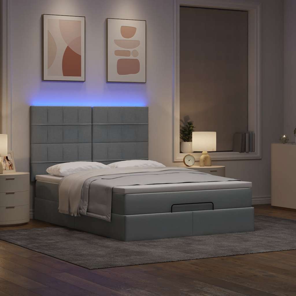 Ottoman bed met matras en LED's 140x200cm stof lichtgrijs