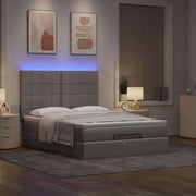Ottoman bed with mattress and LEDs 140x200cm fabric taupe