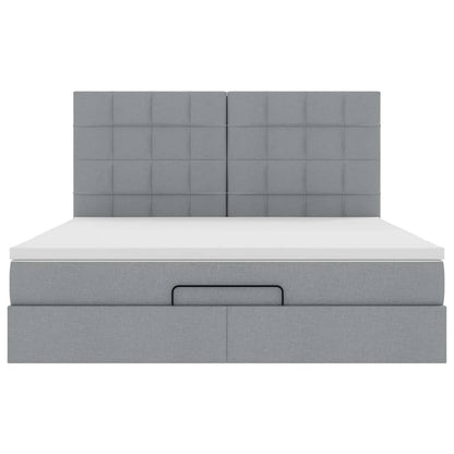 Ottoman bed met matras en LED's 160x200cm stof lichtgrijs