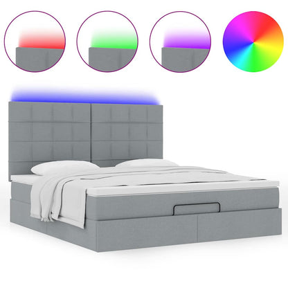 Ottoman bed met matras en LED's 180x200cm stof lichtgrijs