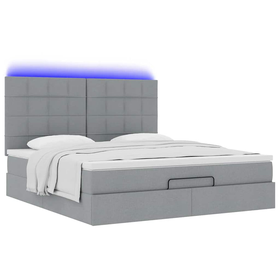 Ottoman bed met matras en LED's 180x200cm stof lichtgrijs