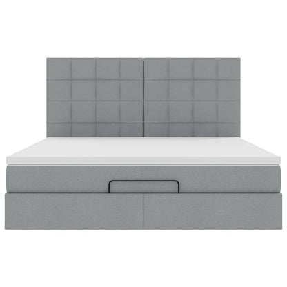 Ottoman bed met matras en LED's 180x200cm stof lichtgrijs