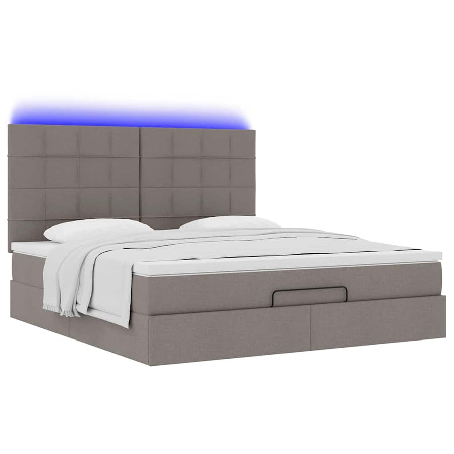 Ottoman bed met matras en LED's 180x200cm stof taupe