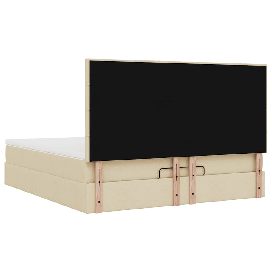 Ottoman bed met matras en LED's 180x200cm stof crèmekleurig