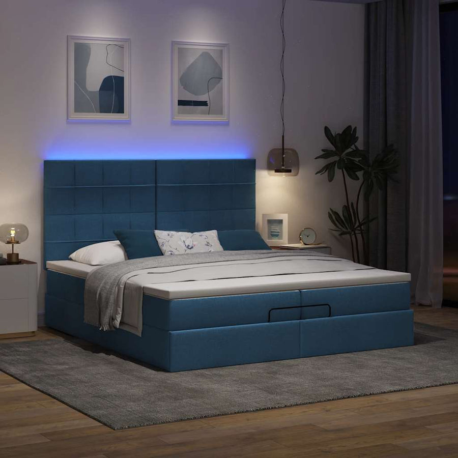 Ottoman bed met matrassen en LED's 200x200cm stof blauw