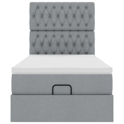 Ottoman bed met matras en LED's 80x200cm stof lichtgrijs