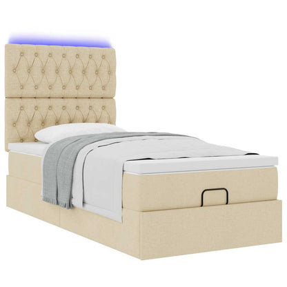 Ottoman bed met matras en LED's 80x200cm stof crèmekleurig