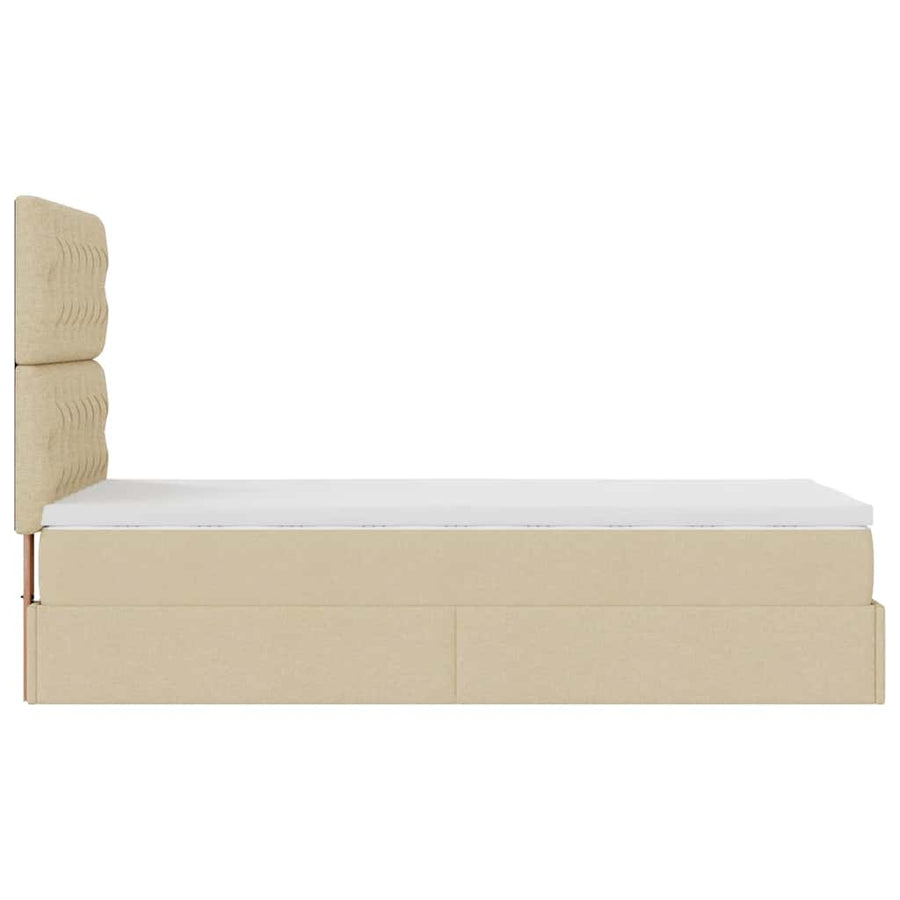 Ottoman bed met matras en LED's 80x200cm stof crèmekleurig