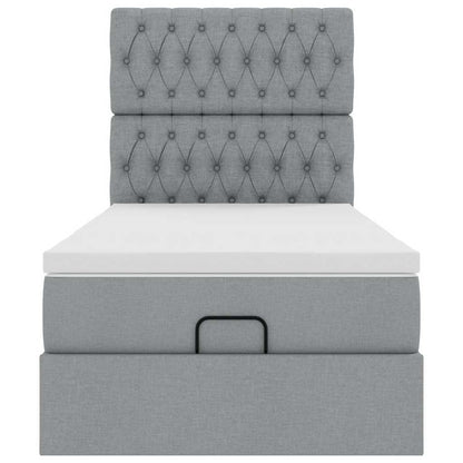 Ottoman bed met matras en LED's 90x190cm stof lichtgrijs