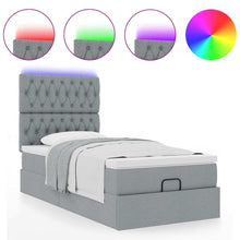 Ottoman bed met matras en LED's 90x200cm stof lichtgrijs