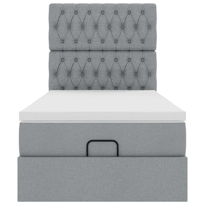Ottoman bed met matras en LED's 90x200cm stof lichtgrijs