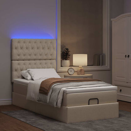 Ottoman bed met matras en LED's 90x200cm stof crèmekleurig