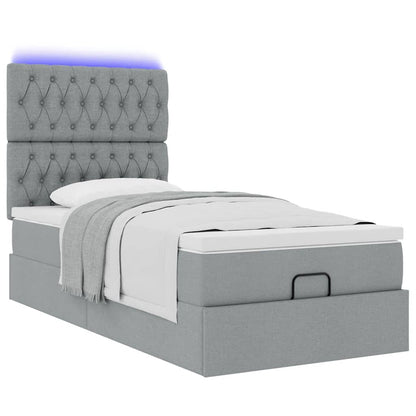 Ottoman bed met matras en LED's 100x200cm stof lichtgrijs