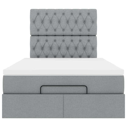 Ottoman bed met matras en LED's 120x190 cm stof lichtgrijs