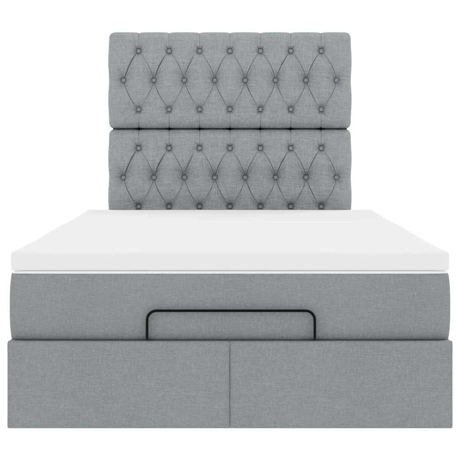 Ottoman bed met matras en LED's 120x190 cm stof lichtgrijs