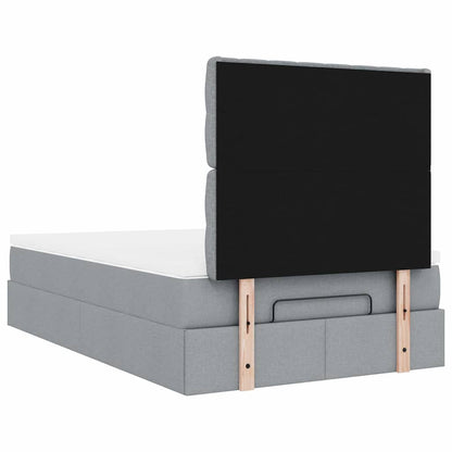 Ottoman bed met matras en LED's 120x190 cm stof lichtgrijs