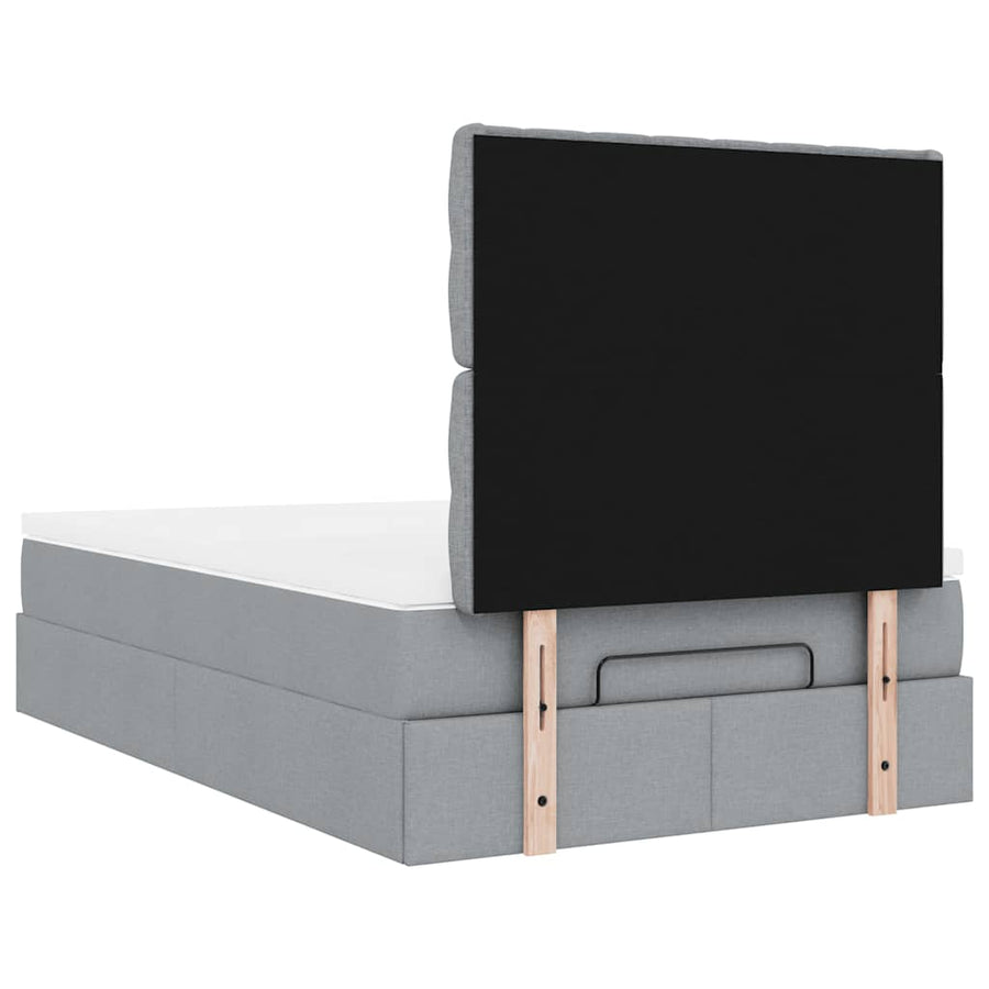 Ottoman bed met matras en LED's 120x200cm stof lichtgrijs