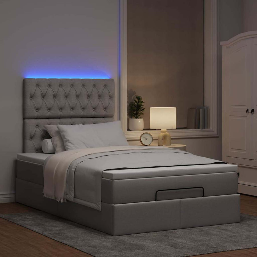 Ottoman bed met matras en LED's 120x200cm stof taupe