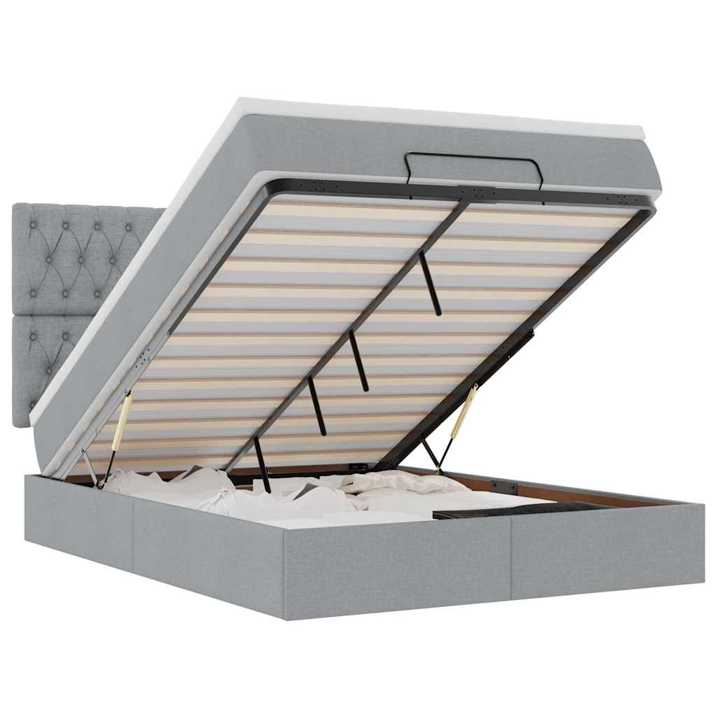Ottoman bed met matras en LED's 140x190cm stof lichtgrijs