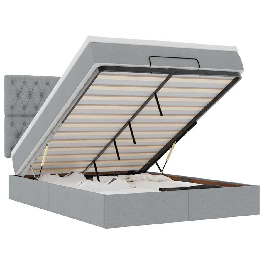 Ottoman bed met matras en LED's 140x190cm stof lichtgrijs