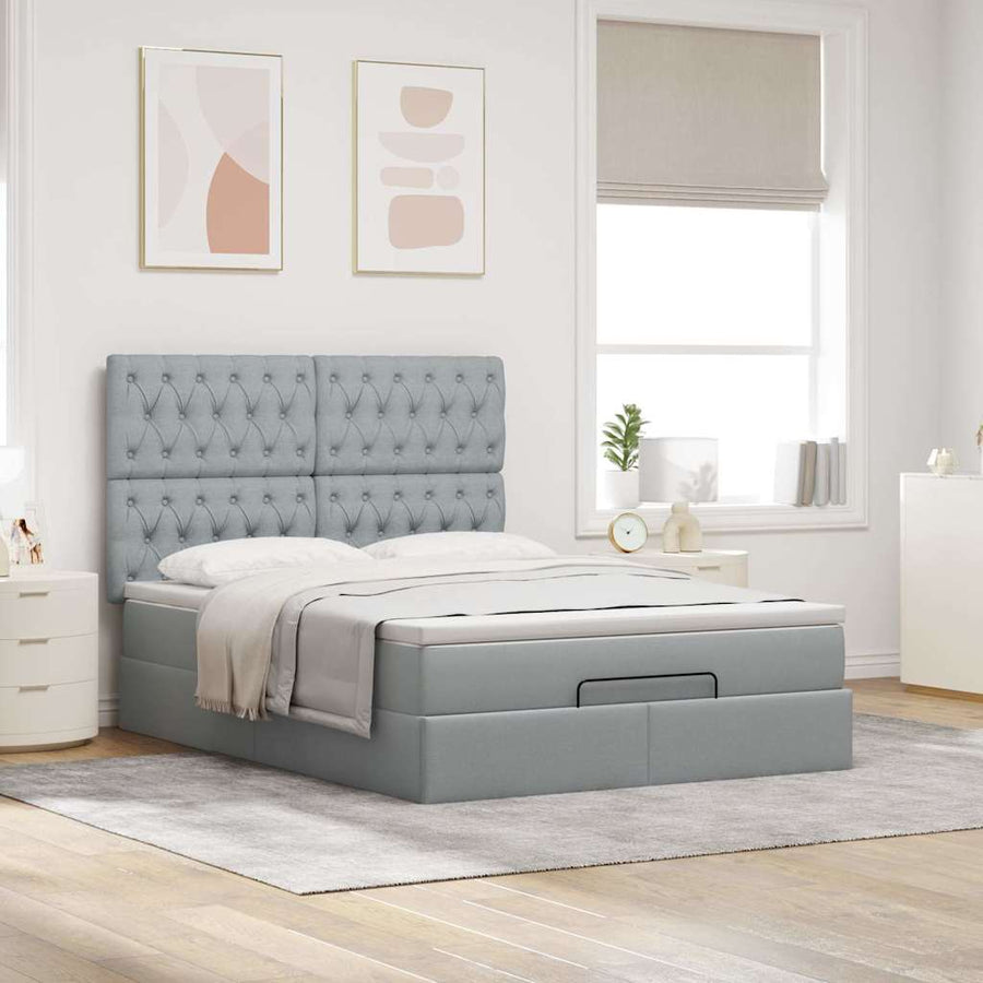 Ottoman bed met matras en LED's 140x190cm stof lichtgrijs