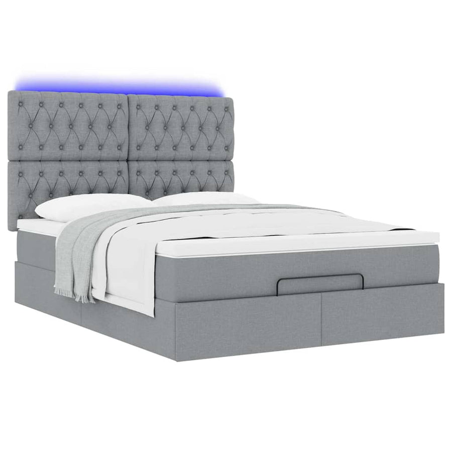 Ottoman bed met matras en LED's 140x190cm stof lichtgrijs