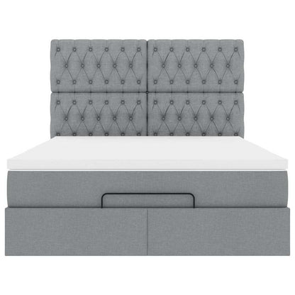 Ottoman bed met matras en LED's 140x190cm stof lichtgrijs