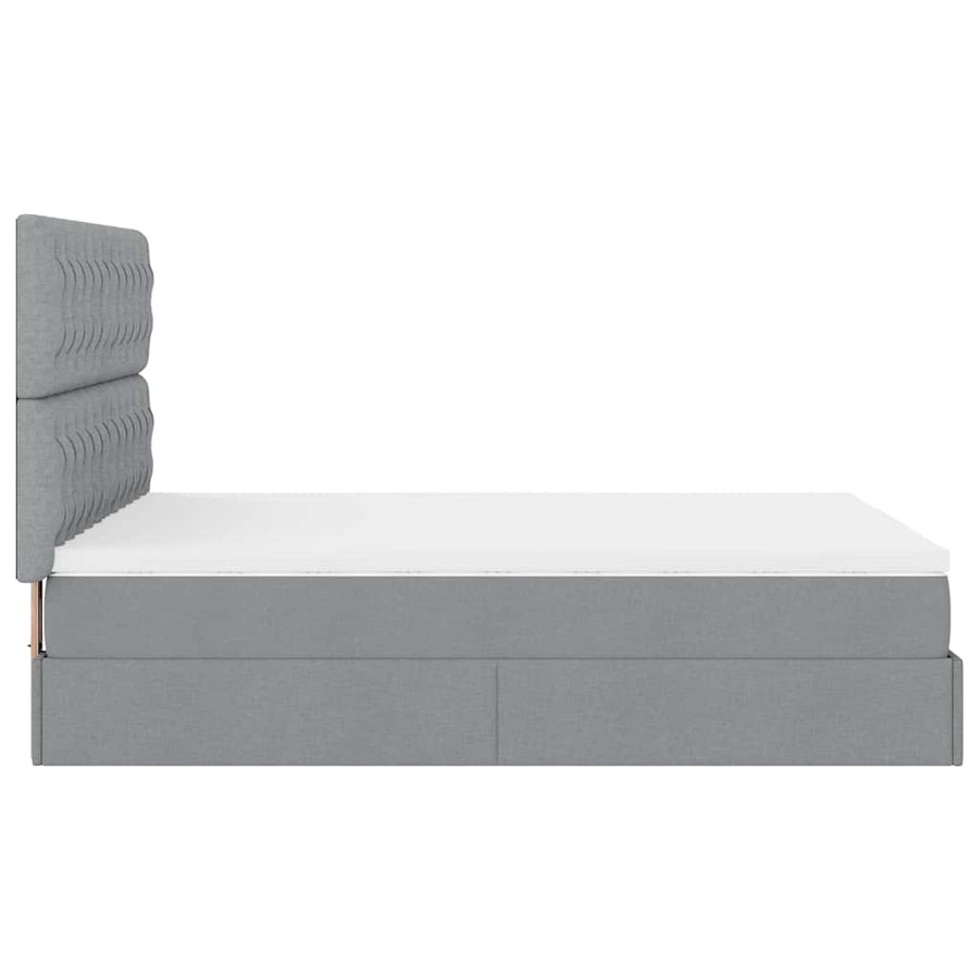 Ottoman bed met matras en LED's 140x190cm stof lichtgrijs