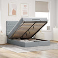 Ottoman bed met matras en LED's 140x190cm stof lichtgrijs