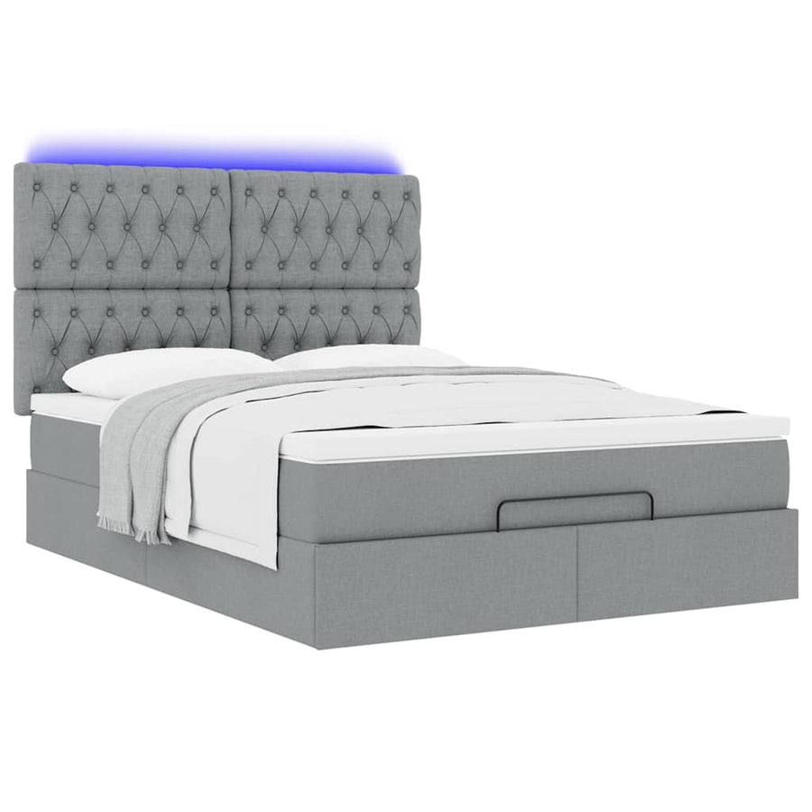 Ottoman bed met matras en LED's 140x200cm stof lichtgrijs