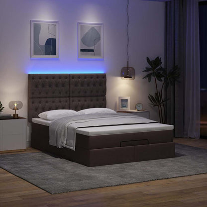 Ottoman bed met matras en LED's 140x200cm stof donkerbruin