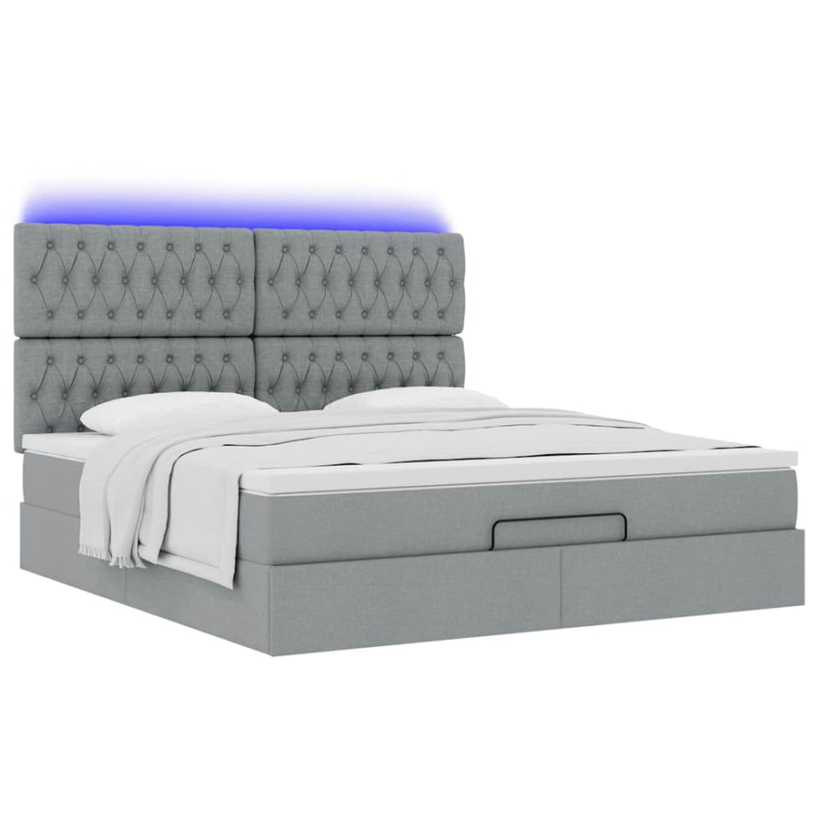 Ottoman bed met matras en LED's 180x200cm stof lichtgrijs