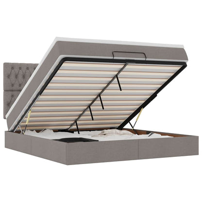 Ottoman bed met matras en LED's 180x200cm stof taupe
