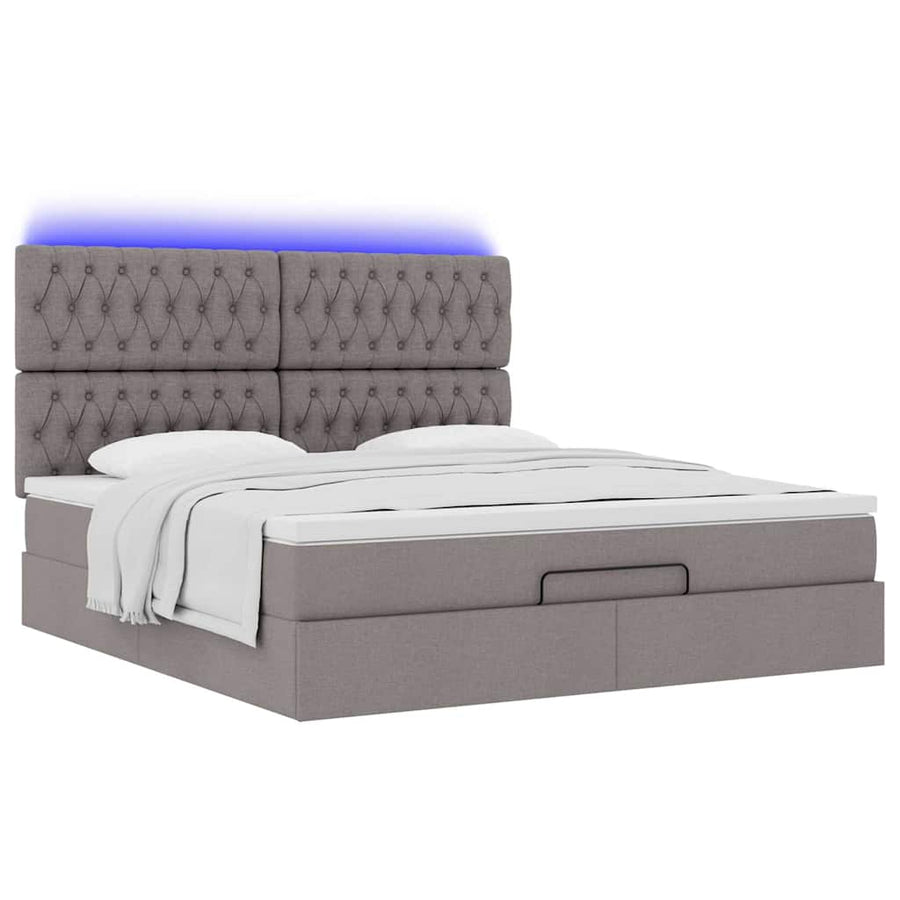 Ottoman bed met matras en LED's 180x200cm stof taupe