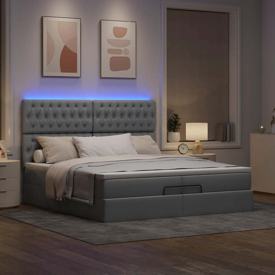 Ottoman bed met matrassen en LED's 200x200cm stof lichtgrijs