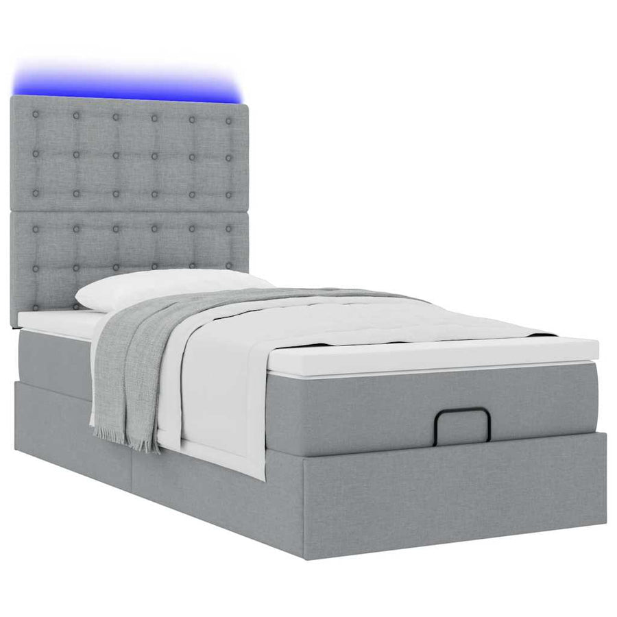 Ottoman bed met matras en LED's 80x200cm stof lichtgrijs