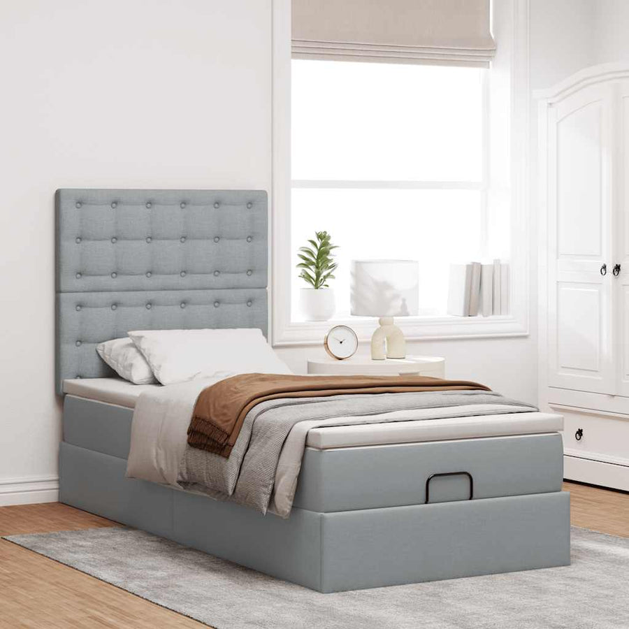 Ottoman bed met matras en LED's 80x200cm stof lichtgrijs