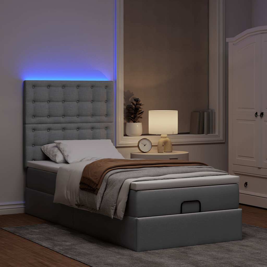 Ottoman bed met matras en LED's 80x200cm stof lichtgrijs