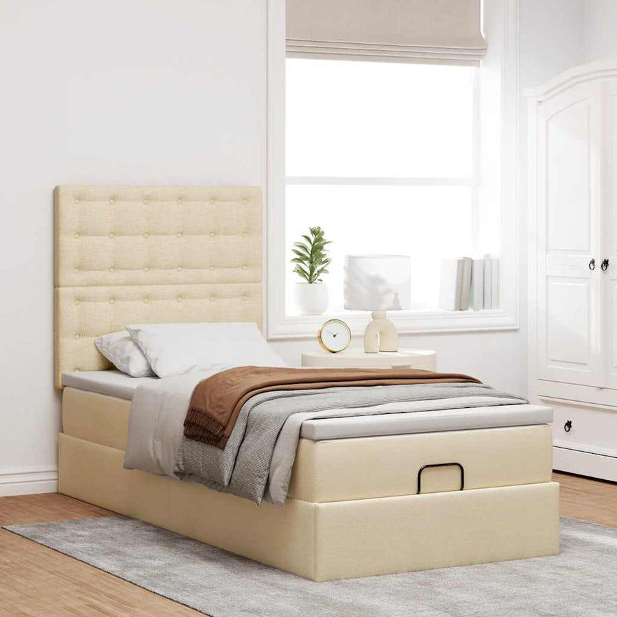 Ottoman bed met matras en LED's 90x200cm stof crèmekleurig