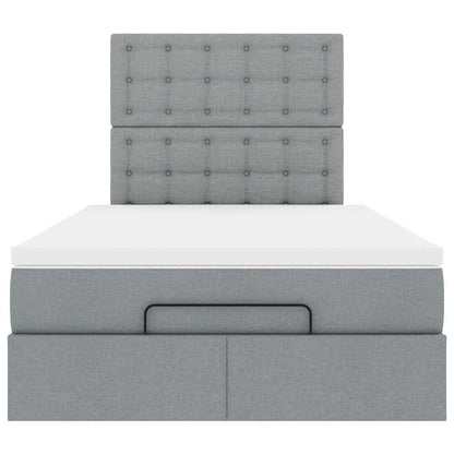 Ottoman bed met matras en LED's 120x190 cm stof lichtgrijs