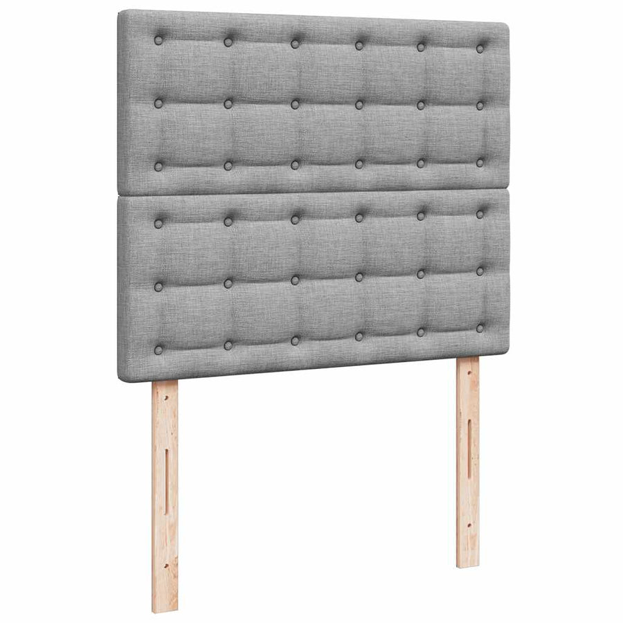 Ottoman bed met matras en LED's 120x190 cm stof lichtgrijs