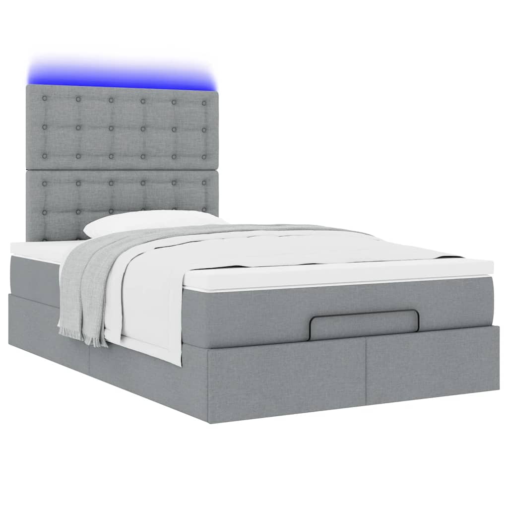 Ottoman bed met matras en LED's 120x200cm stof lichtgrijs