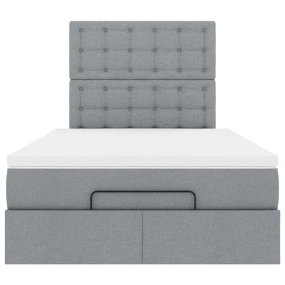 Ottoman bed met matras en LED's 120x200cm stof lichtgrijs
