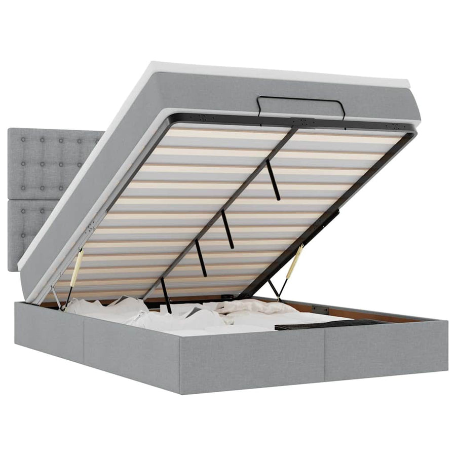 Ottoman bed met matras en LED's 140x190cm stof lichtgrijs
