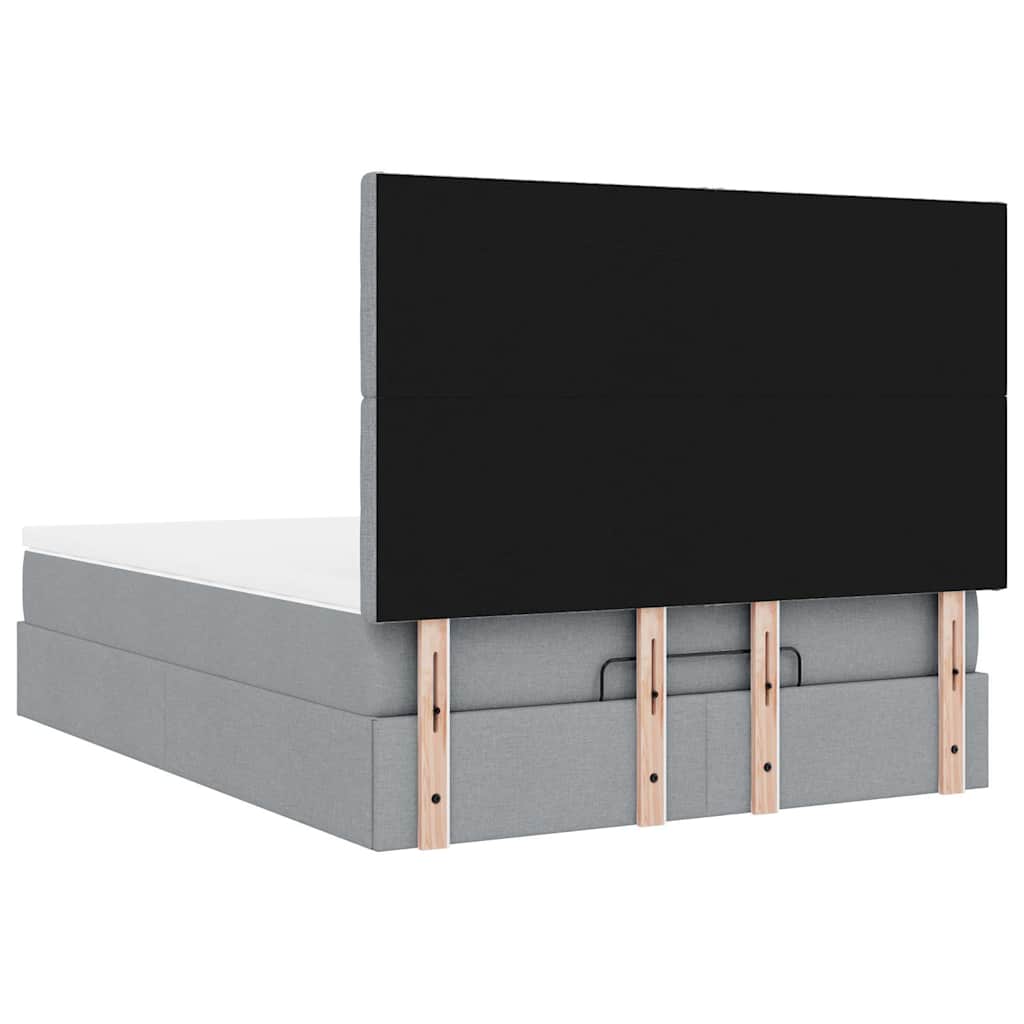 Ottoman bed met matras en LED's 140x190cm stof lichtgrijs