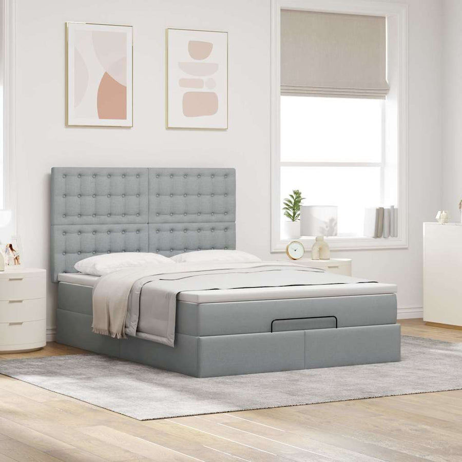 Ottoman bed met matras en LED's 140x190cm stof lichtgrijs