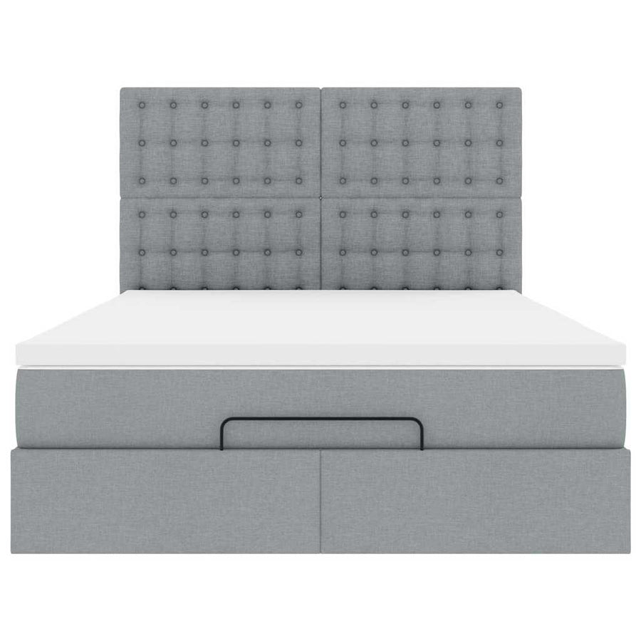 Ottoman bed met matras en LED's 140x190cm stof lichtgrijs
