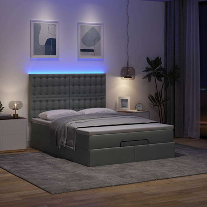 Ottoman bed met matras en LED's 140x190cm stof donkergrijs