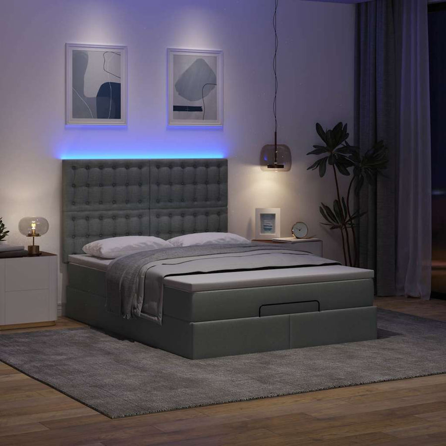 Ottoman bed met matras en LED's 140x190cm stof donkergrijs
