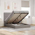 Ottoman bed met matras en LED's 140x190cm stof taupe